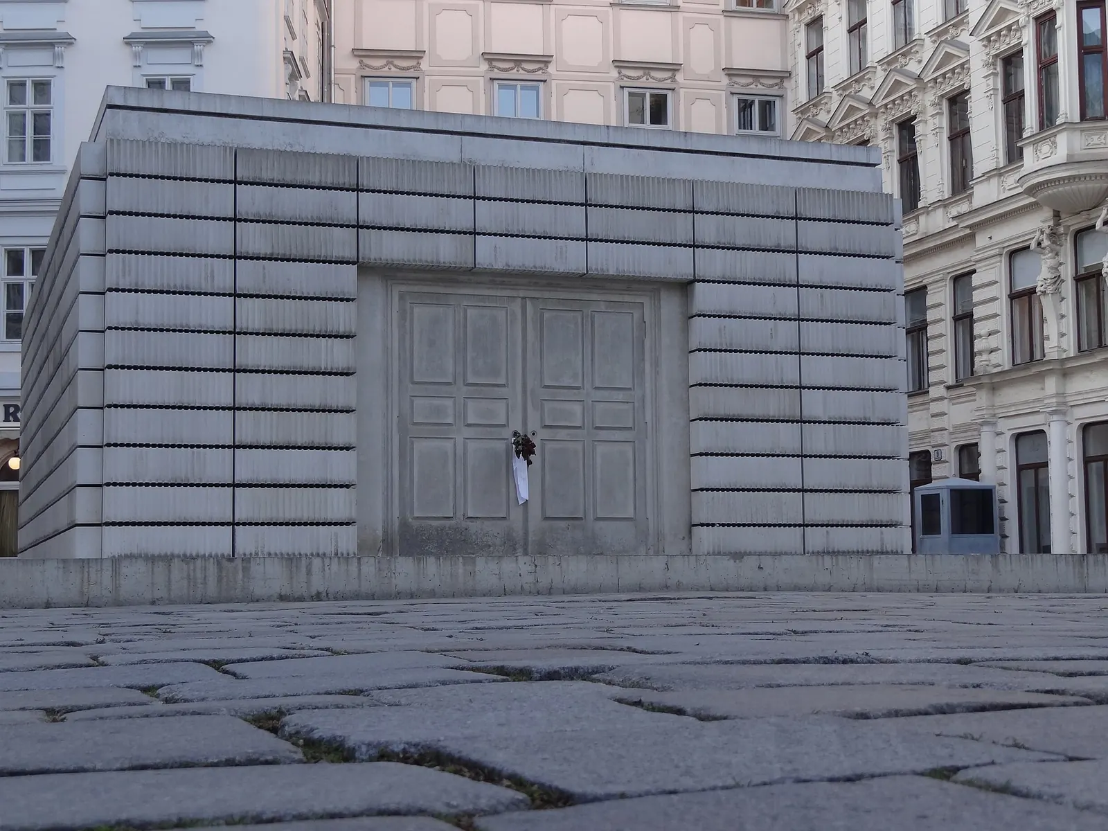 Judenplatz Memorial, Vienna, 2000. House was demolished in 1994 and no free photograph of it exists; this is the same cast-void argument standing in a square.
